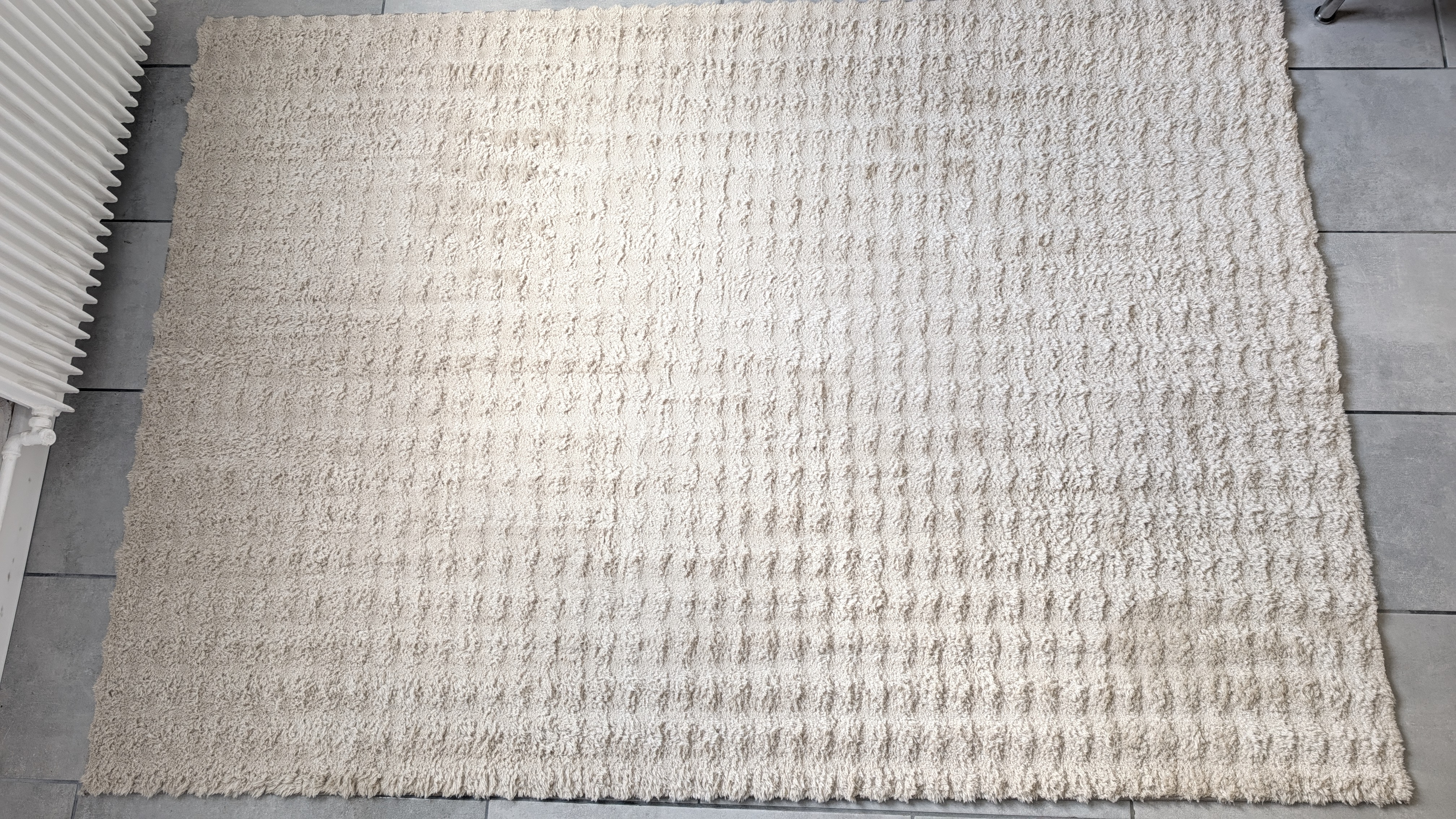 Tapis clair après nettoyage à domicile