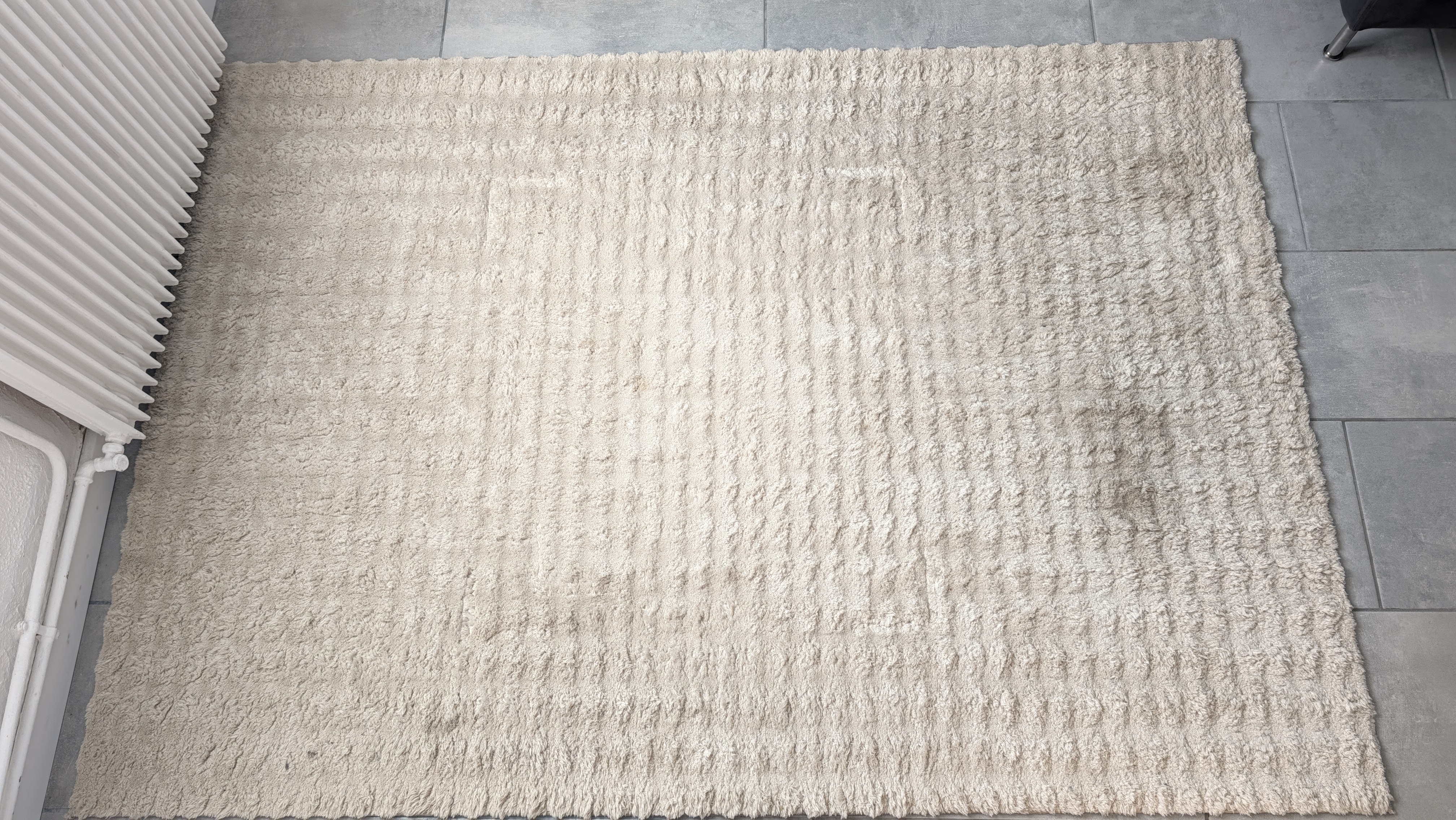 Tapis clair avant nettoyage à domicile